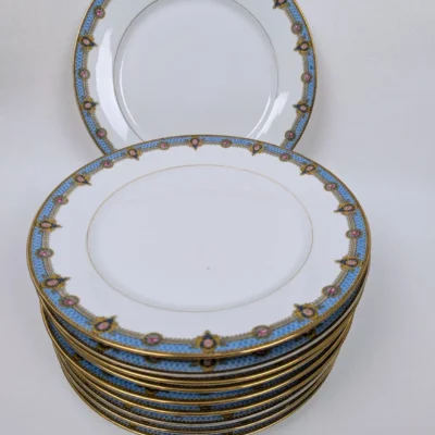 Service d'assiettes plates en porcelaine de Limoges signées Robert Picard