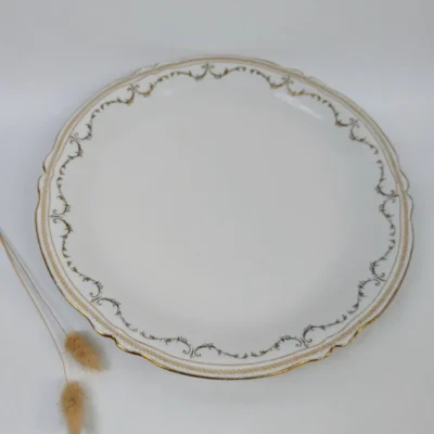 Grand plat de présentation en porcelaine de Limoges signé B&Cie