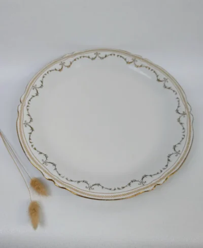 Grand plat de présentation en porcelaine de Limoges signé B&Cie