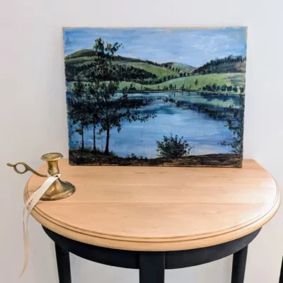 Peinture sur toile représentant un paysage de lac