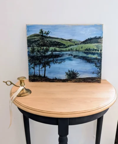 Peinture sur toile représentant un paysage de lac