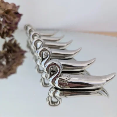 portes couteaux métal argenté forme de cygnes vintage