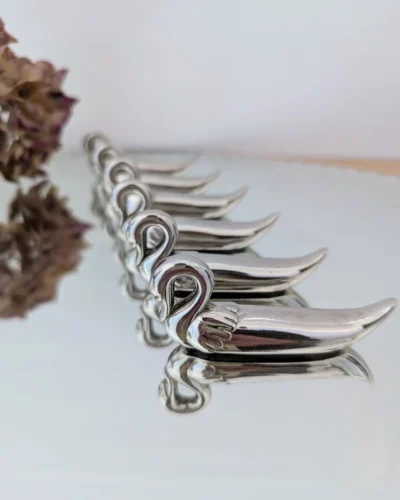 portes couteaux métal argenté forme de cygnes vintage