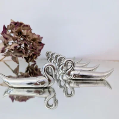 portes couteaux métal argenté forme de cygnes vintage