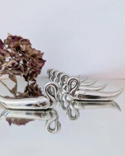 portes couteaux métal argenté forme de cygnes vintage