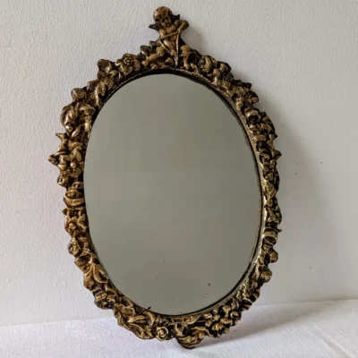 Miroir ancien doré ovale décor ange style entre-deux-guerres - Villa Brieg