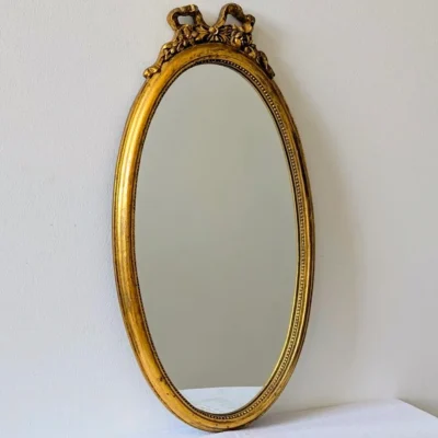Miroir ancien ovale doré style Louis XVI