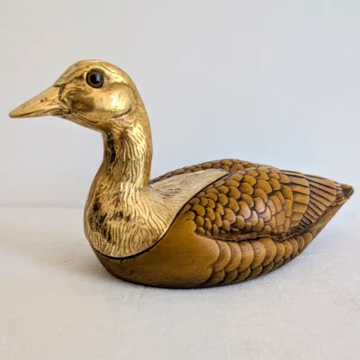 Canard décoratif vintage en résine patinée signé Malevolti profil gauche