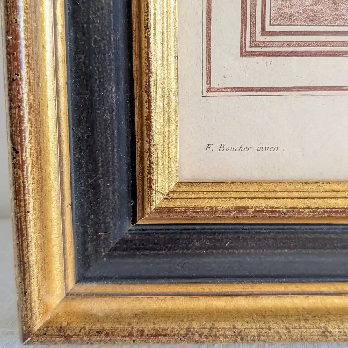 Détail de l'inscription F. Boucher inven. imprimée dans la marge inférieure gauche.